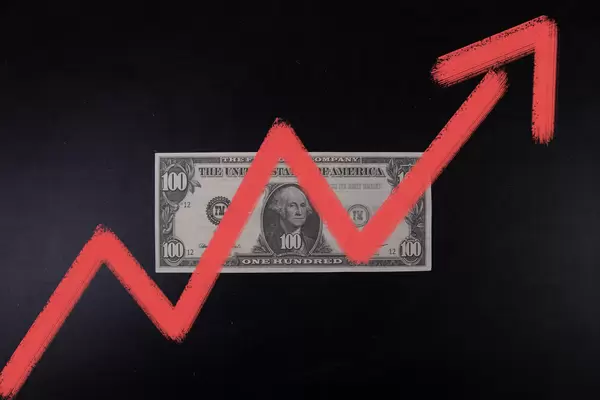 100 Dollar banknote with red up chart