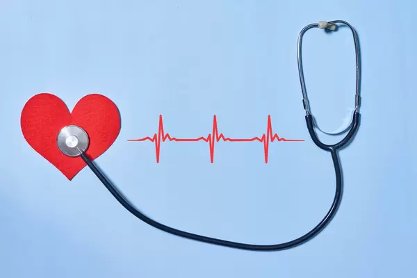 12. Red heart and stethoscope with cardiogram