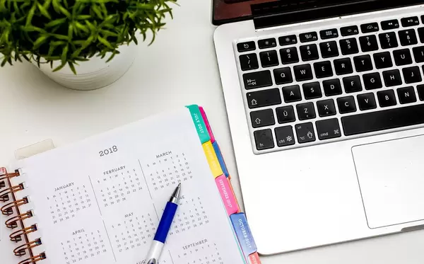 2018 Calendar with Pen and Laptop