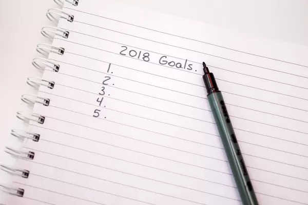 2018 Goals in Notebook with a Pen