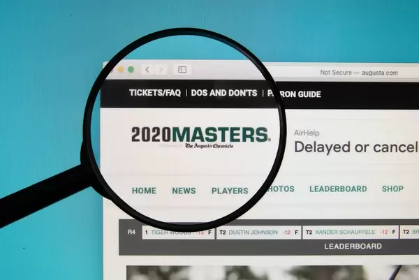 2020 Masters text on a computer screen with a magnifying glass