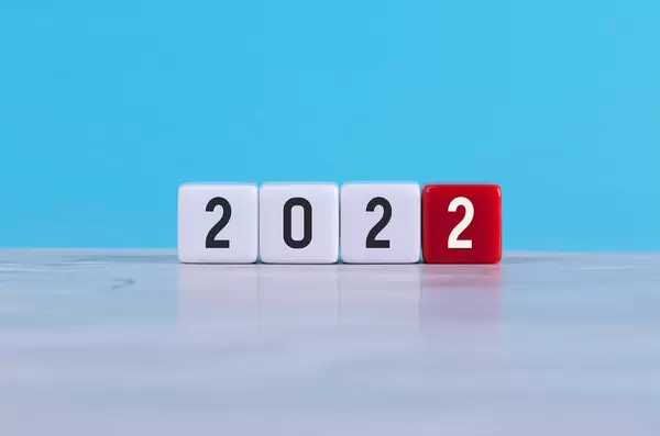 2022 text on white and red cubes