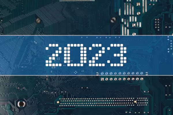 2023 text over electronic circuit board background