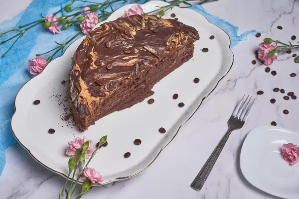 25. Slice of sweet homemade chocolate cake on plate.jpg