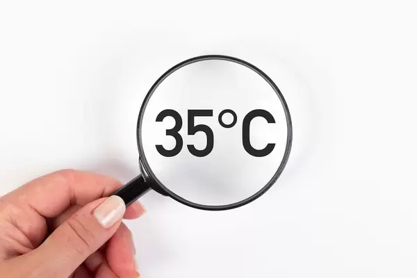 35 degrees Celsius text under magnifying glass