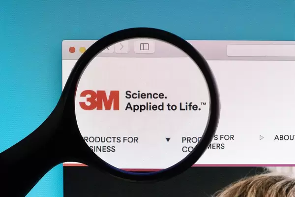 3M logo under magnifying glass