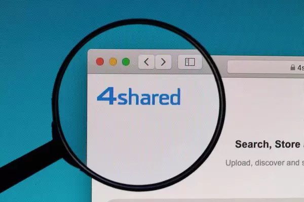 4shared logo under magnifying glass