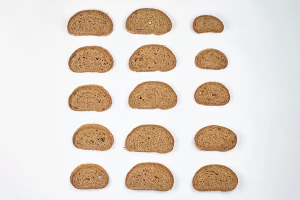 A beautiful arrangement of bread slices on white background