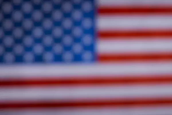 A blurred American national flag