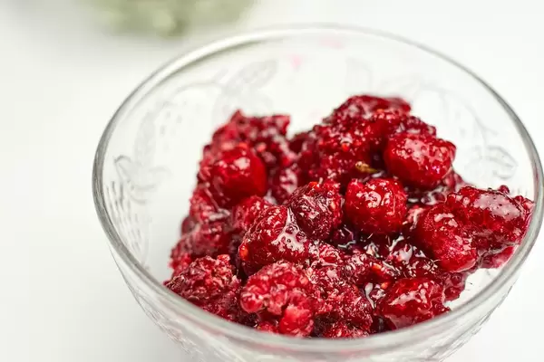 A bowl of raspberry jam