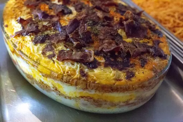 A casserole with crispy bacon on top