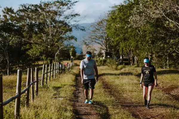 A Couple Walking along a Trail
