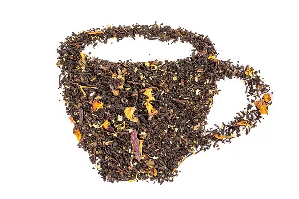 A cup of tea made from dried black tea leaves