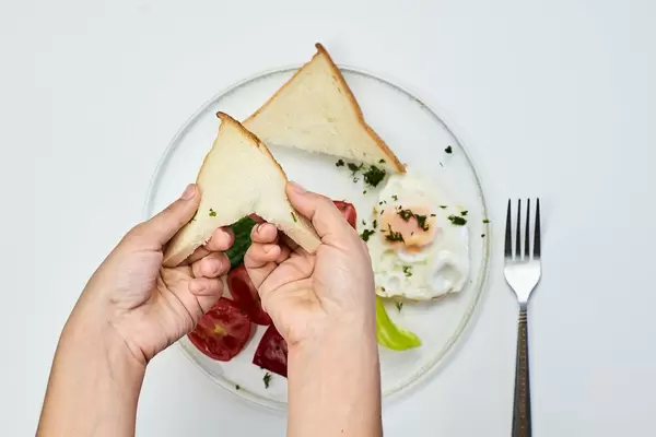 A female having a healthy and nutritious breakfast, overhead view