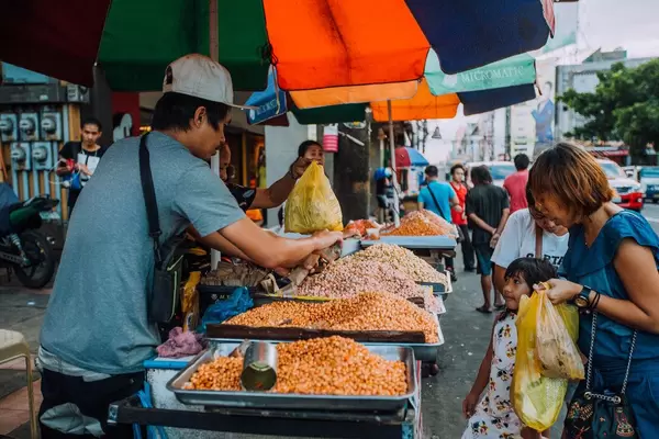 A food vendor selling roasted peanuts in Bacolod City
