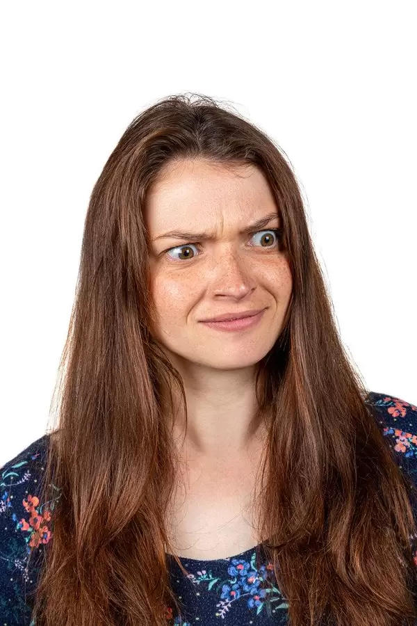 A girl with a very surprised face. The concept of unexpected