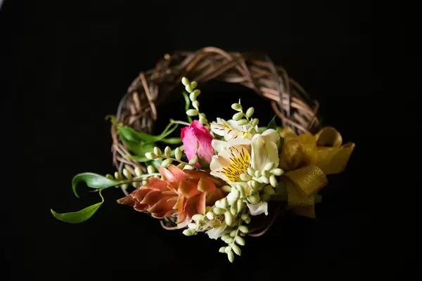 A headdress for a flower girl with dark background  Flip 2019