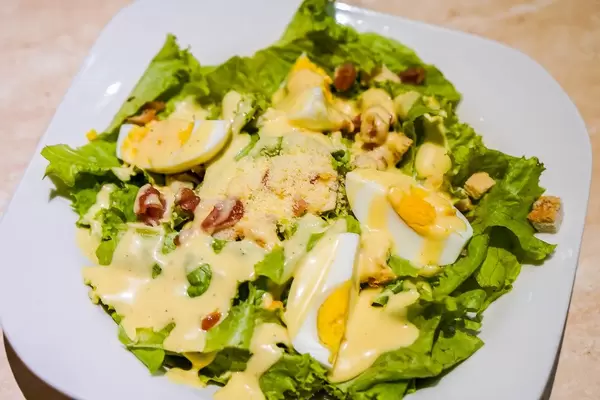 A healthy egg salad plate with creamy sauce (Flip 2019)