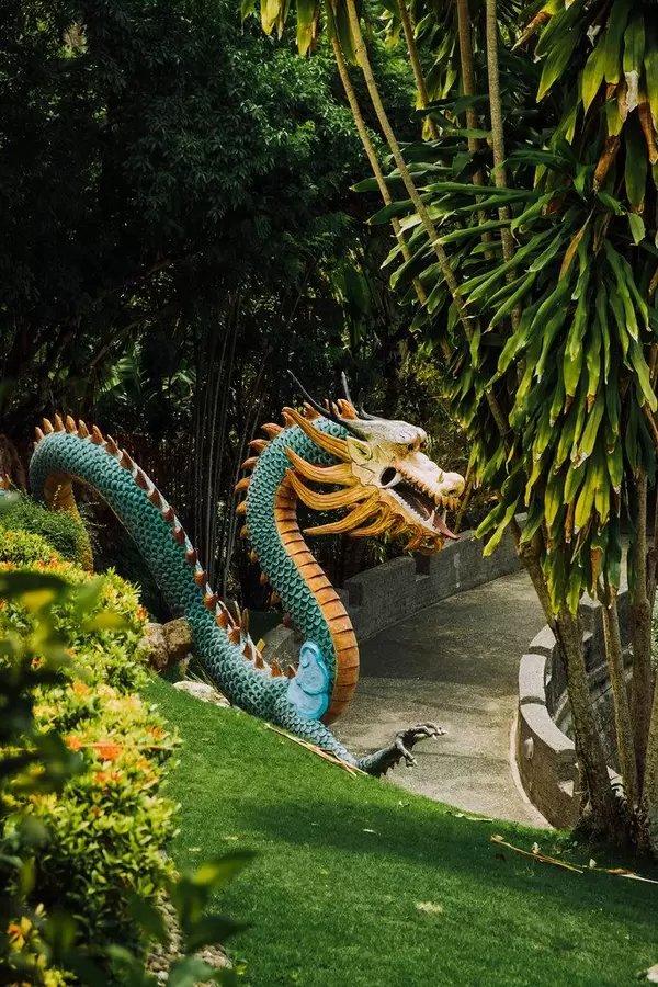 A large dragon statue in a temple