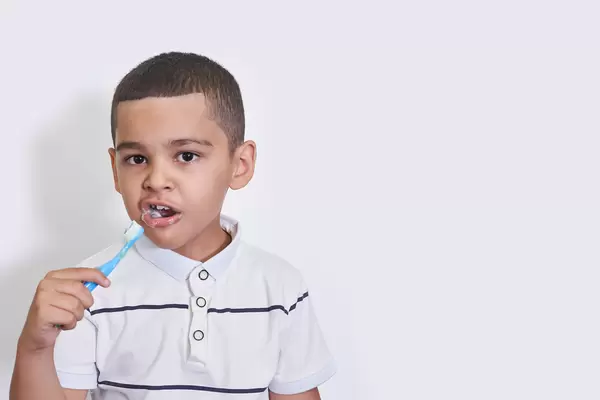 A little boy with toothbrush