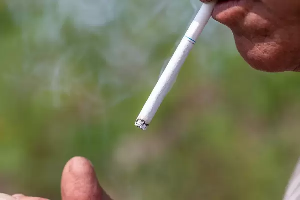 A man smokes. Bad habits concept