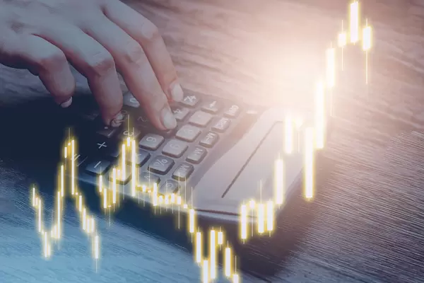 A person calculating economic loss or income