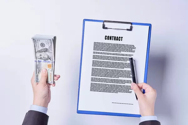 A person offering money if you sign contract