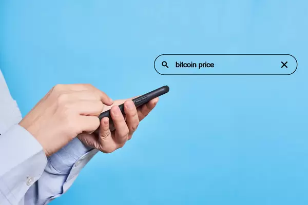 A person searching information about bitcoin price