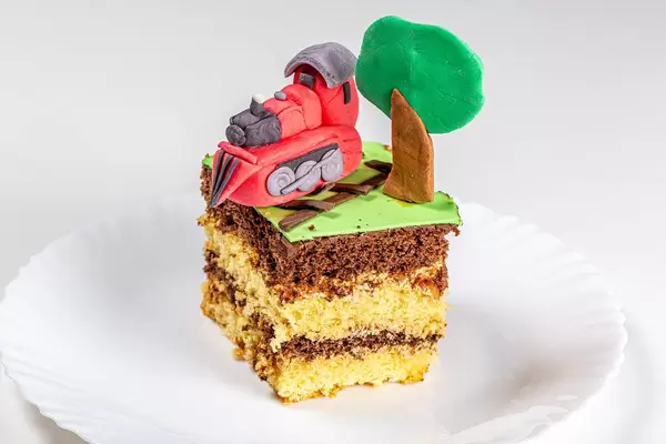 A piece of children's cake with a train