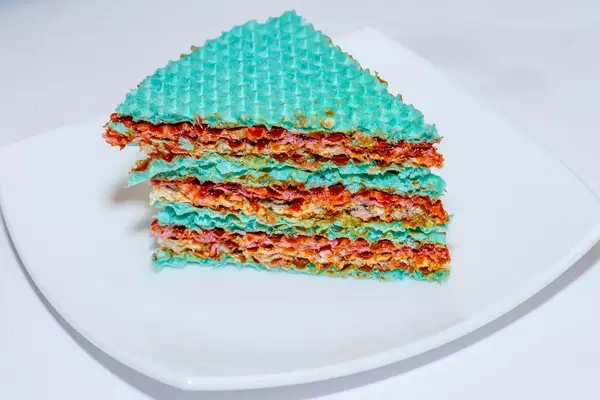 A piece of sweet crispy cake with condensed milk  Flip 2019