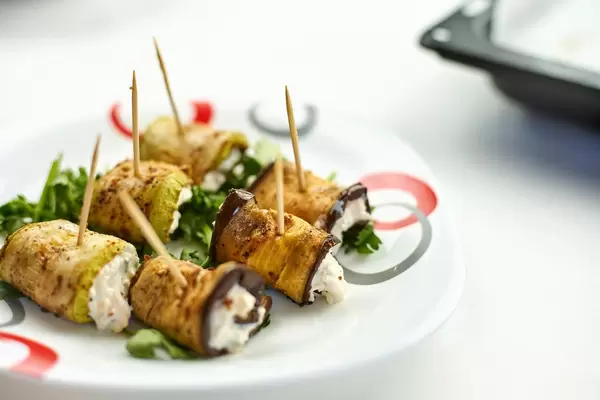 A plate of freshly roasted eggplant rolls