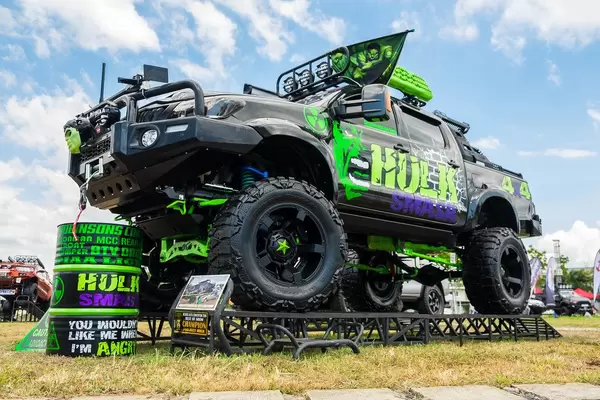 A "Hulk" themed monster truck at a local car show