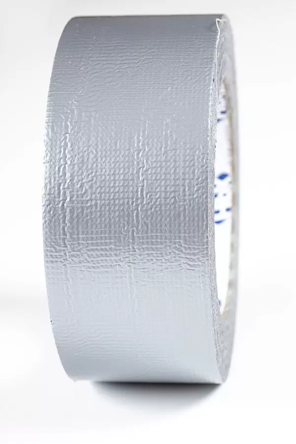 A roll of gray adhesive tape close-up (Flip 2019)