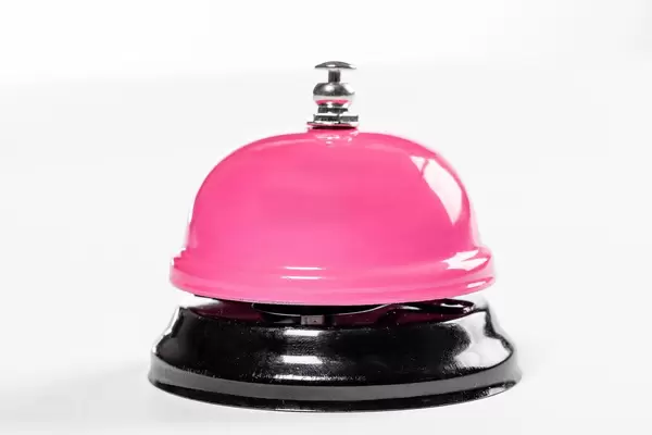 A service pink bell for hotel on white background (Flip 2019)