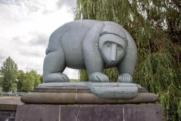 A statue of a bear on the bridge over the Spree river in Berlin, Germany