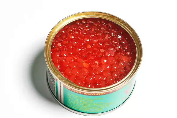 A tin can of red caviar