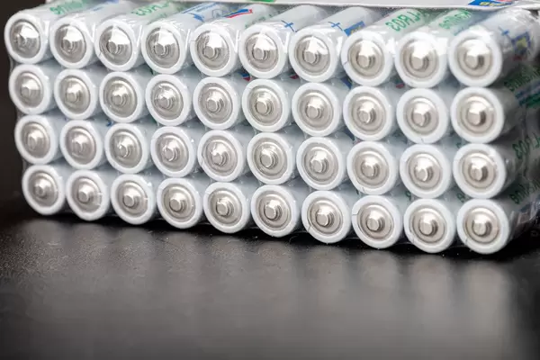 AAA alkaline batteries on a black background (Flip 2020)