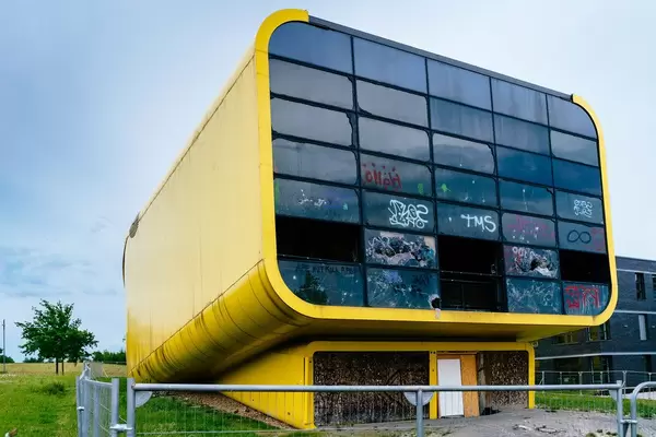 Abandoned Expo 2000 yellow pavilion of Latvia in Hannover Gelände