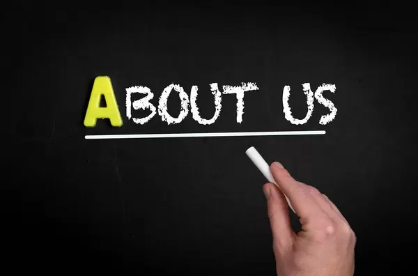About us text on blackboard
