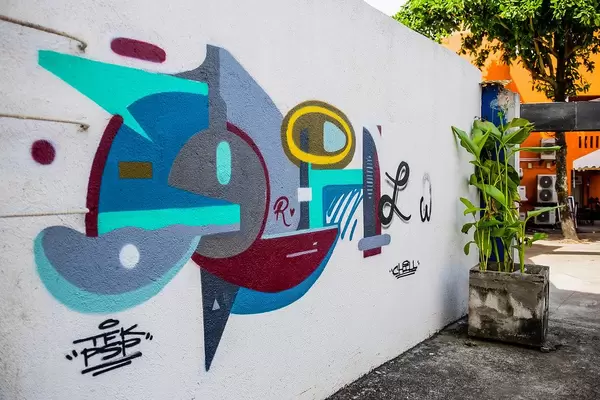 Abstract colourful Graffiti on a white wall