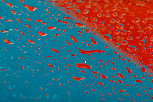 Abstract red-blue background with water drops