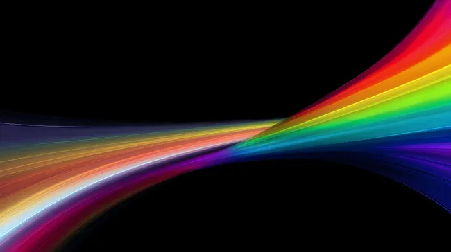 Abstrakte Regenbogenwellenlichtspuren auf schwarzem Hintergrund