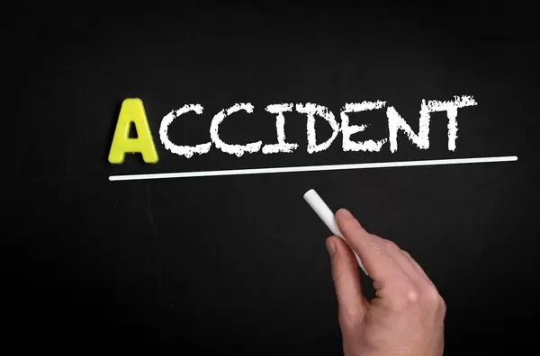 Accident text on blackboard