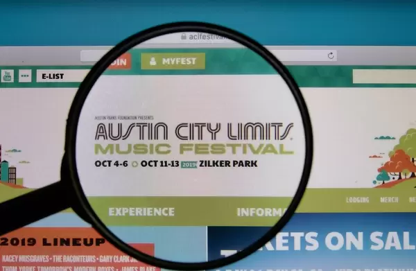 ACL Music Festival logo on a computer screen with a magnifying glass