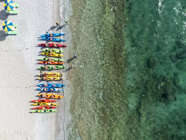Active holiday on the beach of the Greek island Skopelos: kayaks at Milia Beach, drone photo