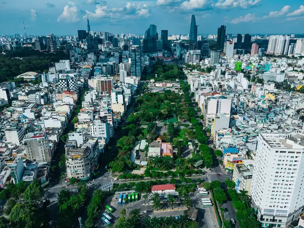 Aerial Drone Photo of 23/9 Park in the City Center with Bitexco Financial Tower and Lanmark 81 in the Background in Ho Chi Minh City, Vietnam