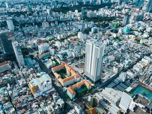 Aerial Drone Photo of District 1 of Ho Chi Minh City, Vietnam with Buidlings, Constructions and no Traffic due to a Lockdown