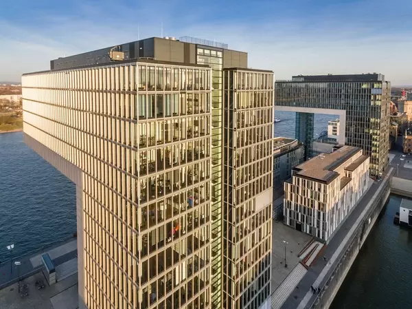 Aerial: First Kranhaus of Rheinauhafen in Golden Hour