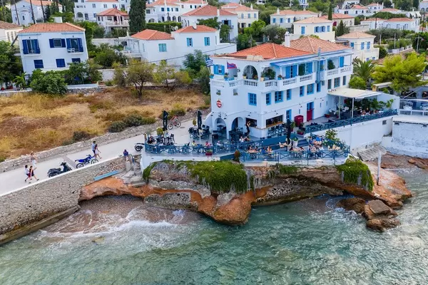 Aerial picture of Restaurant Cielo Mar and Havana Club with an open-air bar at the rocky shore of Spetses