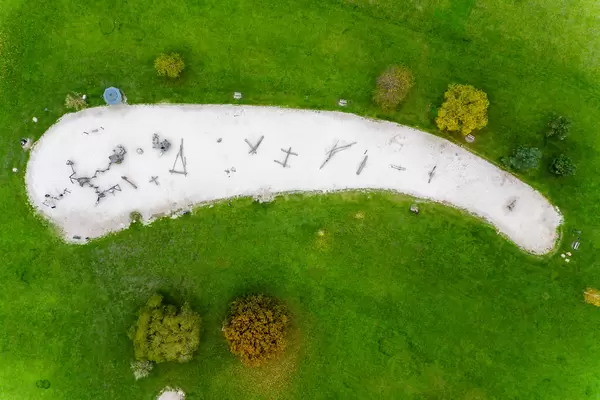 Aerial shot of an adventure playground during fall for outdoor activities with kids in a botanical garden